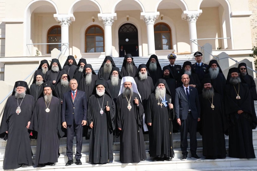 Patriarch Daniel of Bulgaria with accompanying hierarchs, received on the steps of a building in Karyes, Mount Athos